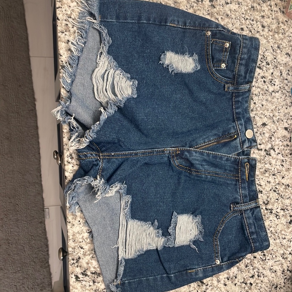 Never worn SHEIN blue jean shorts size Large.